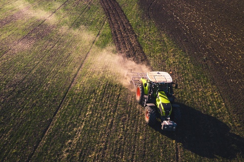 Farmer in field on tractor